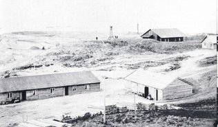 Gammelt sort hvidt foto af anlæggelsen af Esbjerg havn i spetember 1869