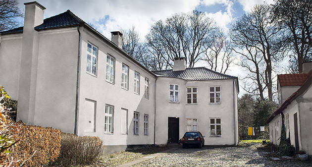 Manipuleret foto, der viser, at den kommende bygning bliver grå.